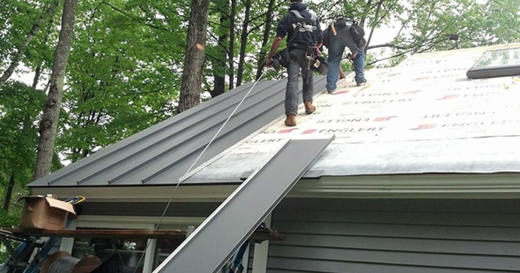 professionals installing Metal roofing